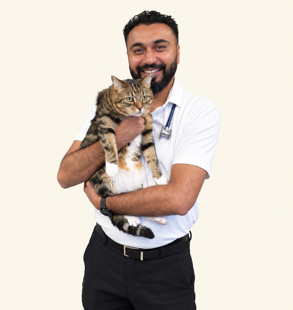 Dr. H. S. Maan holding a cat at Peach City Animal Hospital
